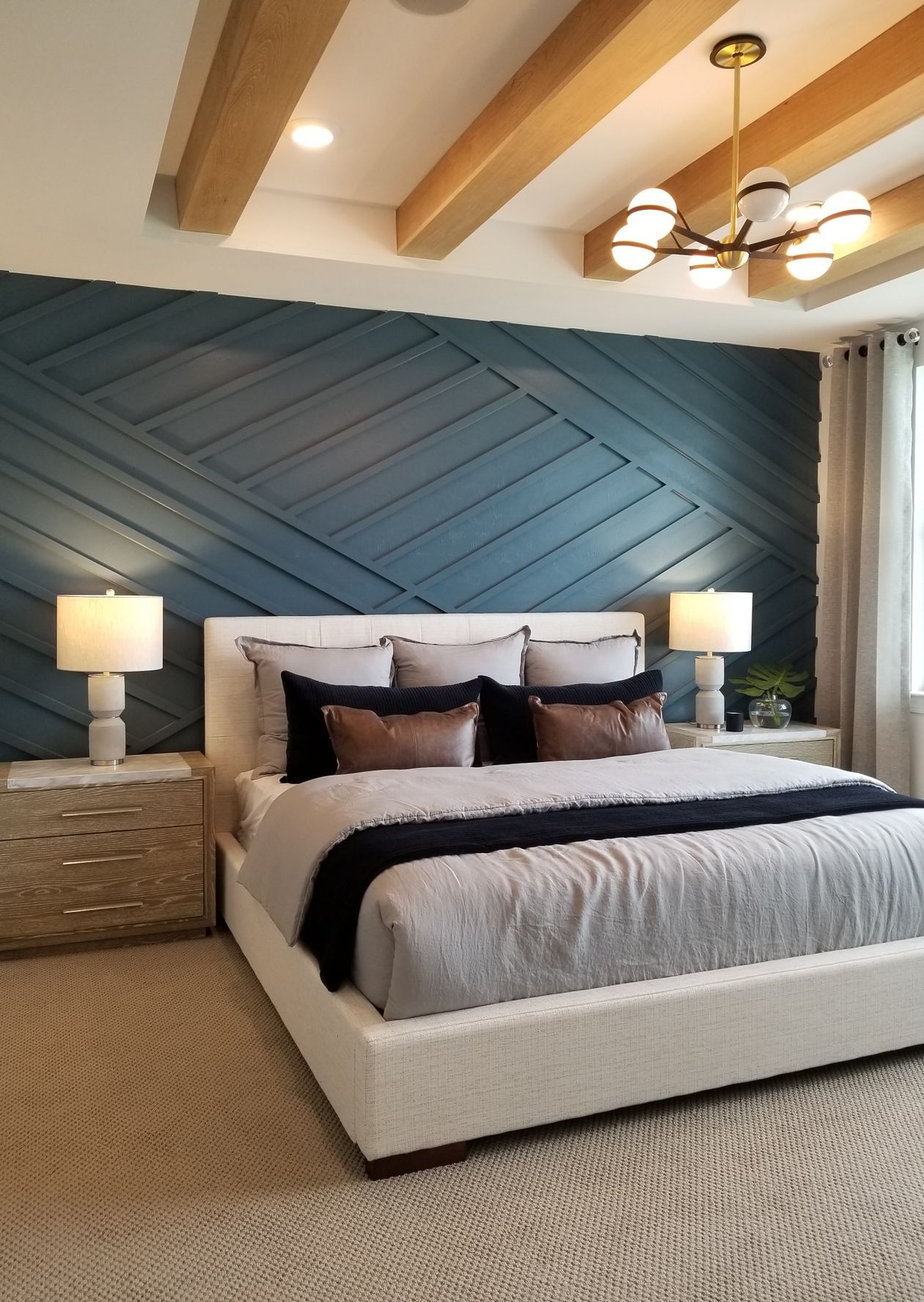 Blue accent customized wall design in bedroom