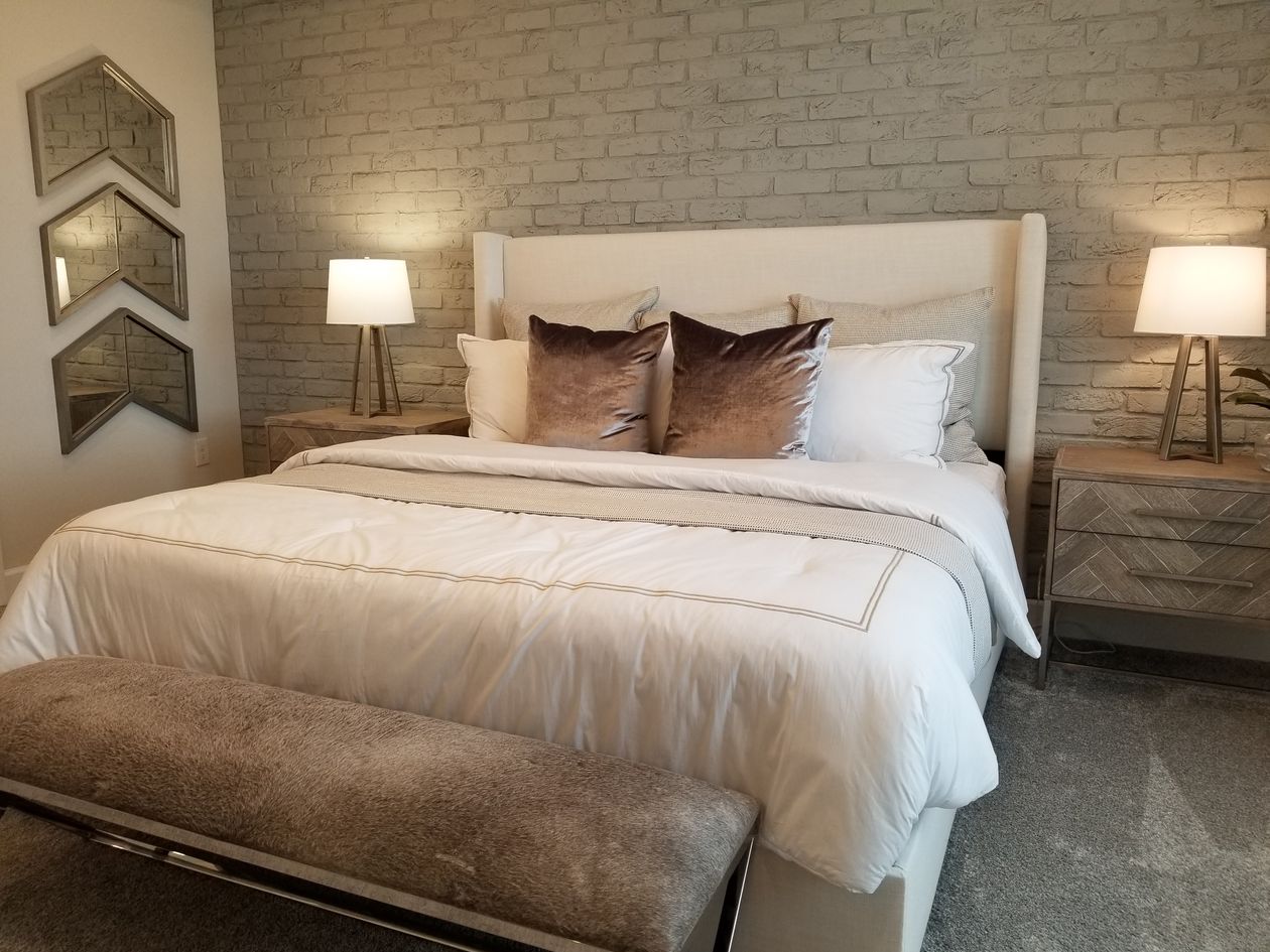 Brick accent customized wall design in bedroom