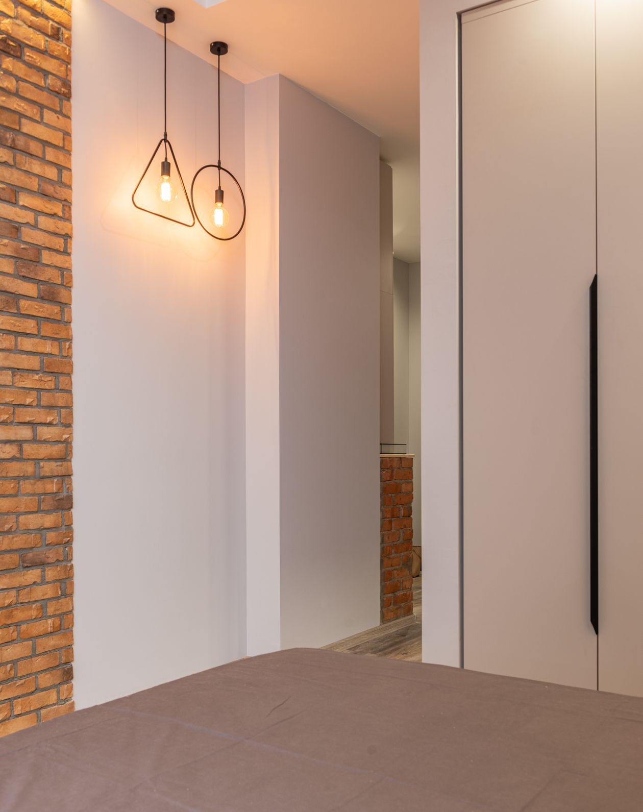 Exposed brick customized wall design in modern living room