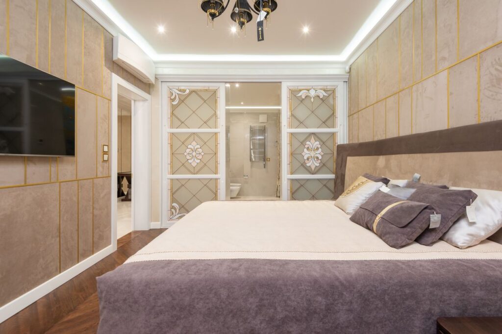 Bright luxury bedroom interior design with sophisticated furnishings