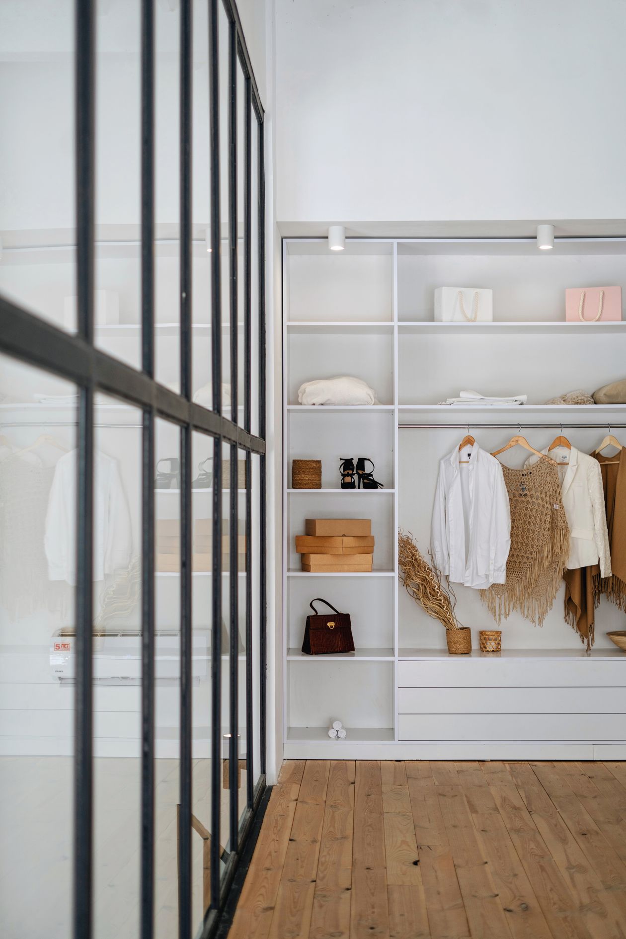 Apartment storage ideas with organized modern wardrobe