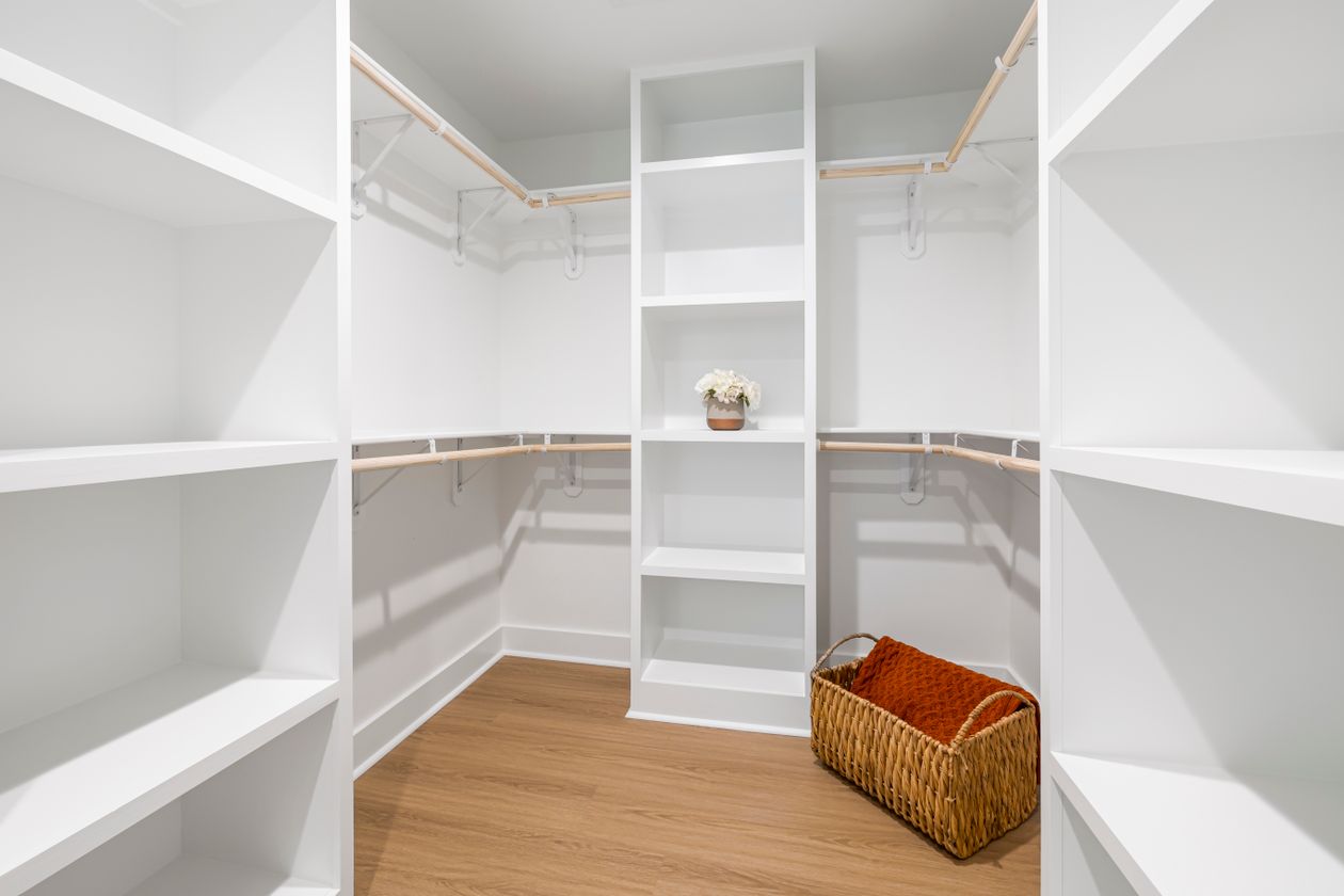Home storage hacks walk-in closet with organized shelves