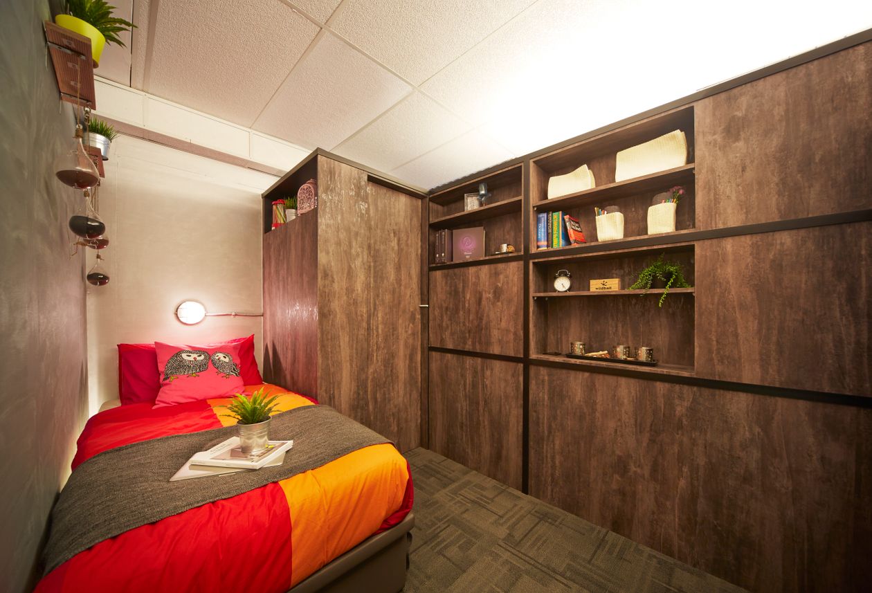 Small bedroom apartment storage ideas with compact cupboard