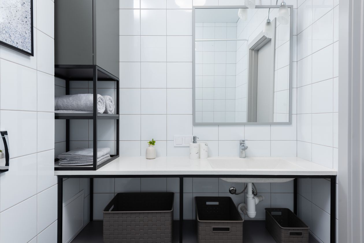 Home storage hacks bathroom with mirror and storage shelves